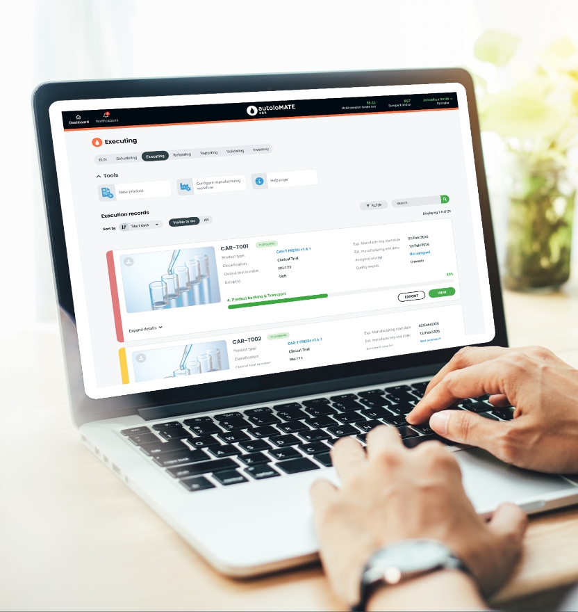Person using laptop with workflow management dashboard